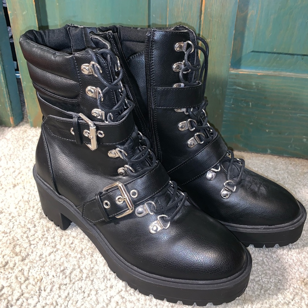 Perfect condition, never worn. Size 9. Black combat boots